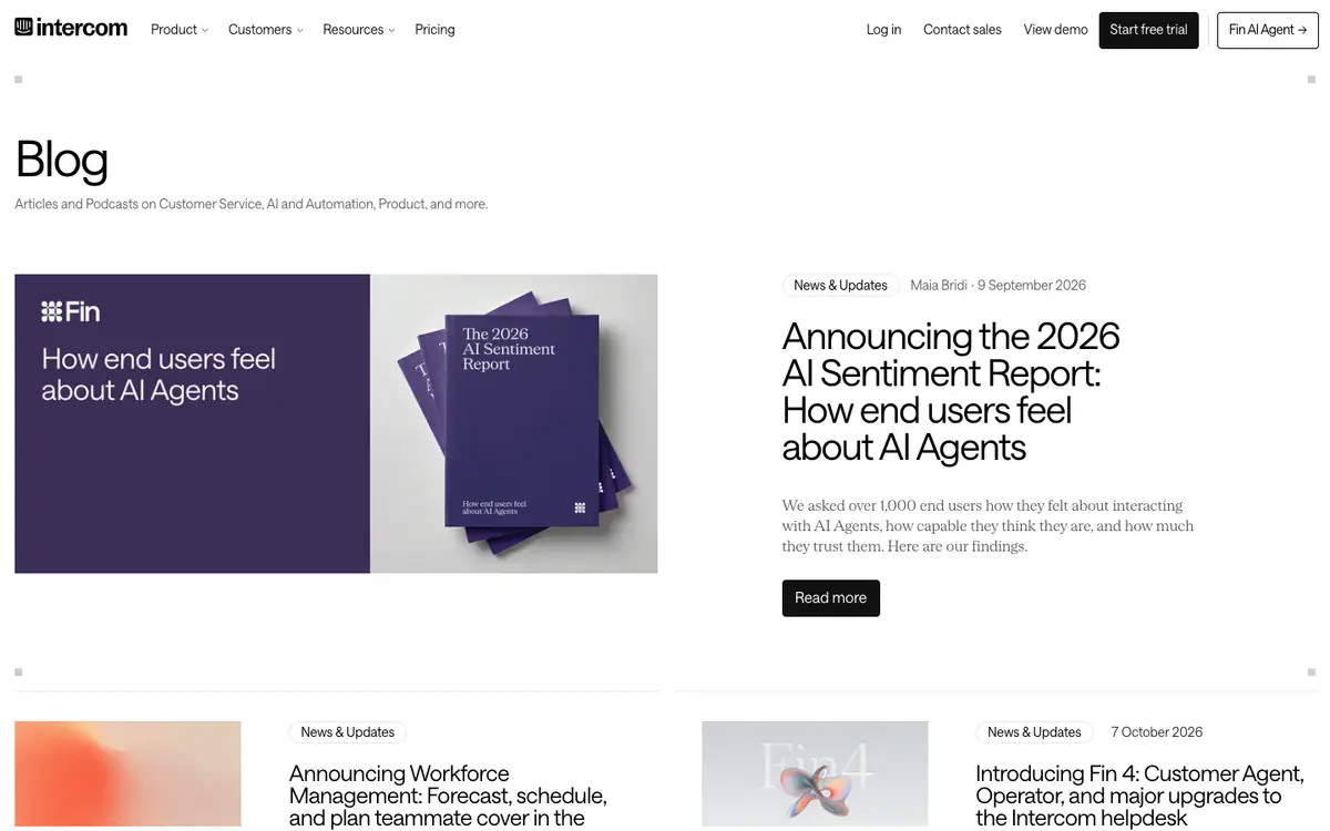 Intercom blog: a featured AI Sentiment Report post with a purple report cover, and News & Updates posts below