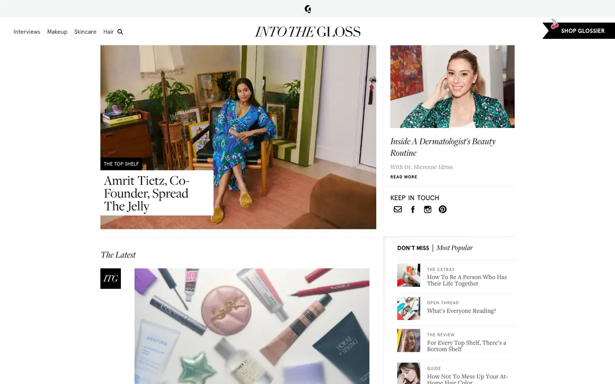 Into The Gloss homepage: interview photo labeled The Top Shelf, a dermatologist feature and a Most Popular list