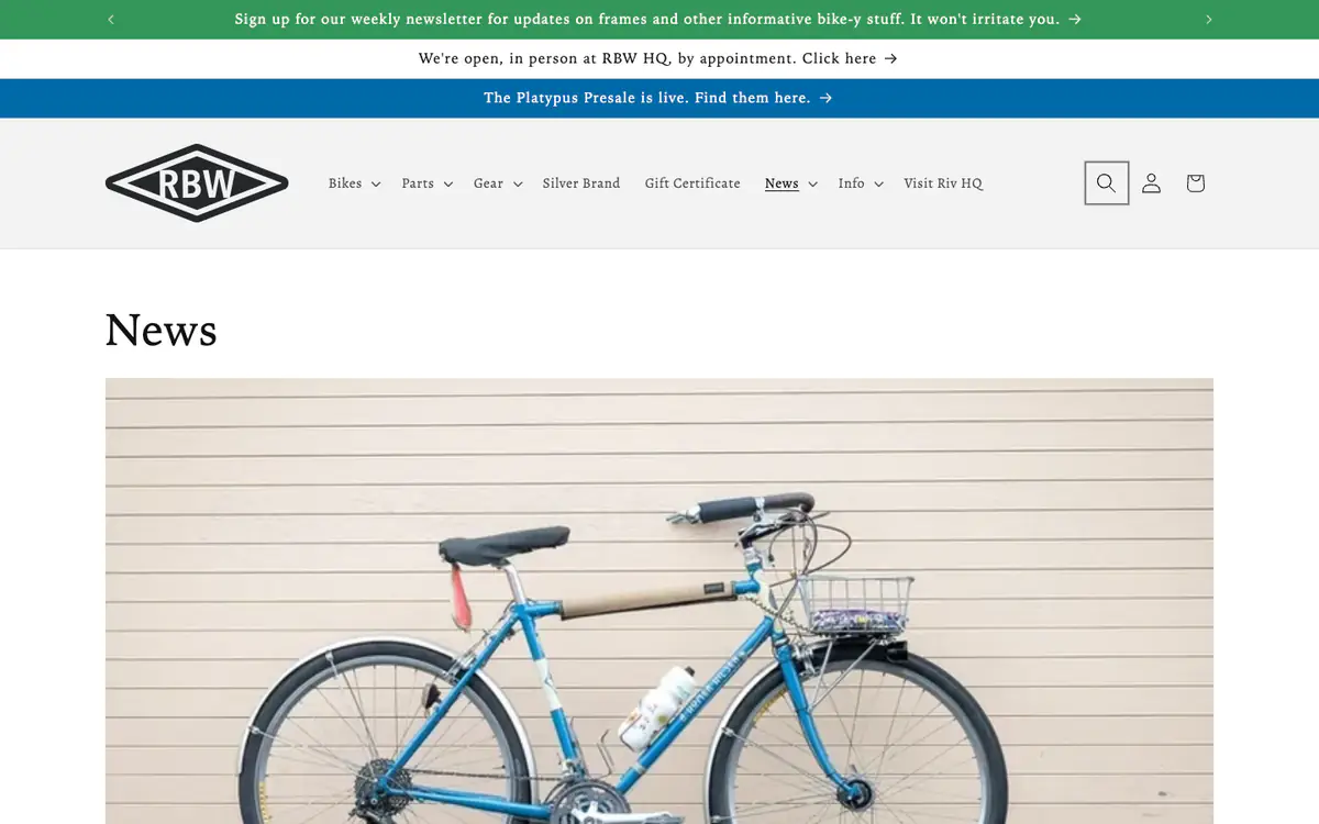 Rivendell Bicycle Works News page: green, white and blue announcement bars, the RBW logo and a large photo of a blue bike
