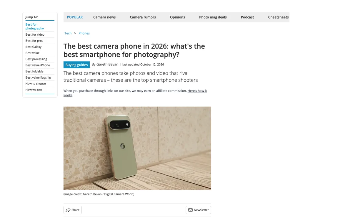 Digital Camera World listicle: a Jump To sidebar, the headline “The best camera phone in 2026”, a subhead and a photo of a phone on a wooden floor
